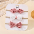 Baby nylon headband set with pink corduroy and white lace bows on a display card - Pink And White Corduroy Style (3E)