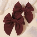 Pair of deep red waffle texture bow hair clips for girls displayed on a beige background - Wine Red (2A-3) / 2 Pcs/Set