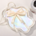 Elegant cream double-layer satin bow hair clip with long ribbons on an iridescent tray - Beige