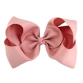 Detail of soft pink 8-inch grosgrain ribbon bow hair clip with layered 3D structure - Dusty Pink