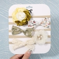 Set de 4 diademas de nylon para bebé con flores de tela y lazos en tarjeta blanca - Serie Verde Amarillo (5E)