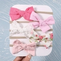 5-piece baby bow headband set with pink, lace, and floral patterns on nude elastic bands - Lotus Pink Series (5L)