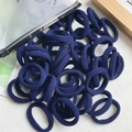 Bulk pack of high-elastic navy blue seamless hair ties for kids with frosted storage bag - Dark Blue