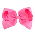 Close-up of pink 8 inch hair bow with detailed ribbed grosgrain ribbon texture - Hot Pink