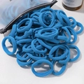 Bulk pack of high-elasticity bright blue nylon hair ties pouring from a frosted zipper bag - 20 Pieces Set / Bright Blue (7)