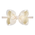 Macro shot of cream bow baby headband made of textured grosgrain ribbon and elastic nylon - Cream White (21)