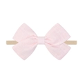 Detail of pink cotton-linen bow headband showing woven texture and soft elastic nylon band - Pink Bow (3)