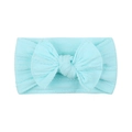 Detail of light blue nylon baby headband featuring cable knit texture and large bow knot - Light Blue (17)