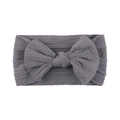 Detail of soft ribbed nylon baby headband featuring a large knitted bow in dark grey - Mauve (23)