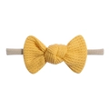 Detailed macro view of yellow waffle knit baby headband with textured bow design - Yellow (40)