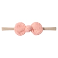 Close-up of pink waffle knit texture and bow detail on high-elastic baby headband - Pink (8)