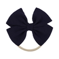 Soft nylon headband for baby girls featuring a navy blue textured bow with rib details - Deep Blue (04)