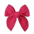 Detailed view of the fuchsia satin fabric texture on the large 5.1 inch hair bow clip - Rose Red (9)