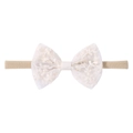 Detail view of the soft white lace butterfly bow on a nylon baby headband for infants - White
