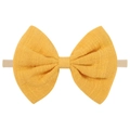 Detail of a bright yellow cotton bow headband with a pink elastic nylon strap for infants - Bright Yellow (10)