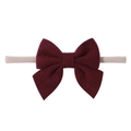 Soft nylon baby headband with a large dark red felt bow and beige elastic band - Dark Red