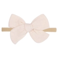 Detail view of a soft cotton bow on a flexible nylon headband for infants and babies - Cream White (21)