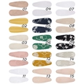 Detail view of fifteen embroidered fabric BB hair clips with floral patterns and scalloped edges - Mixed Color Assortment