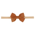 Detail of a brown ribbed ribbon bow headband on a seamless beige nylon hair tie - Caramel Brown