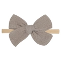 Close-up of soft cotton muslin bow headband with high-stretch seamless nylon band - Taupe (23)