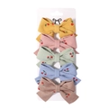 Lot de cinq barrettes nœuds en velours côtelé avec broderie cerise coloris variés - Série Velours Côtelé Broderie Cerise