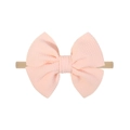 Detail van roze baby hoofdband met wafelstructuur strik en zachte elastische nylon band - 8-Lichtroze