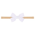 Detailed view of handmade white ribbed bow on a high-stretch nylon baby headband - White