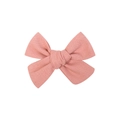 Pink handmade fabric bow hair clip for children featuring textured cloth material - Solid Pink