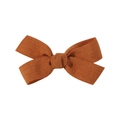 Handmade fabric bow hair clip for girls in rust red color with cotton linen texture - Caramel color
