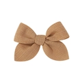 Detail of a brown fabric bow hair clip featuring a textured linen-cotton weave material - Brown (2)