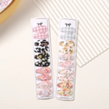 Detailed view of children's floral print BB hair clips set on white paper cards - Pastel Gingham and Floral Set