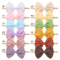 Set aus 12 farbenfrohen Baby-Stirnbändern mit handgefertigten Baumwollschleifen - Benutzerdefinierte Farbe (Mindestbestellmenge 500)