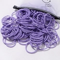 Elastic purple hair ties set in a frosted storage bag for girls hair accessories - 50 Pieces / Purple