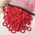 Elastische rote Nylon-Haargummis für Mädchen mit einem Cartoon-Matt-Reißverschlussbeutel - 20er Set / Rot
