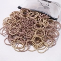 Elastic seamless hair ties in beige and pink with a frosted duck zipper pouch - 50 Pieces / Earth Tone
