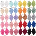 Detailed view of 20 colors waffle fabric bow headbands with soft nylon bands for babies - Multicolor Mixed