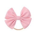 Close-up of pink waffle texture bow headband with ultra-soft seamless nylon strap - Pink (9)
