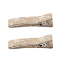 Detail of two beige embroidered linen flower hair clips with handmade fabric wrapping - Khaki
