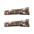 Detailed close-up of brown fabric hair clips with delicate white floral embroidery - Coffee