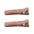 Detail of two brick red fabric hair clips with white floral embroidery on metal duckbill base - Brick Red