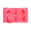 Detailed view of flexible pink nylon headband with large grosgrain ribbon bow - Bright Pink (210-019)