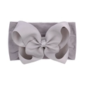 Close-up of grey jacquard bow headband for infants showing soft nylon fabric texture - Gray (012-039)
