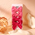 Detailed view of pink waffle fabric and soft felt bow hair clips on display card - Light Pink And Peach Pink Texture Style (2)