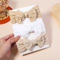 Set aus 3 elastischen Baby Stirnbändern mit Jacquard Schleifen in Beige und Weiß - 3M (Ohne Karton)