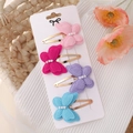 Detail showing four embroidered butterfly hair clips with pearls and gold metal back clips - Pink Purple Blue Rose Red Combination (1)