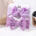 Set of two purple baby headbands featuring ribbed ribbon and waffle texture bows - Purple Shades (25)