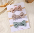 Set di 3 fasce per capelli a fiocco in morbida maglia a coste rosa, beige e verde - Rosa Cipria, Beige Chiaro, Verde Oliva (6)