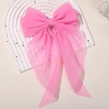 Pink large mesh bow hair clip with polka dot texture and elegant long flowing ribbons - Hot Pink