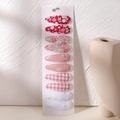 Dettaglio di 10 fermagli per capelli in tessuto stampato su un cartoncino bianco - Stile Floreale Rosso e Rosa e Quadri (10X)