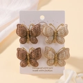 Detail of four handmade knitted butterfly hair clips in brown and beige on a card - Brown and Cream (4F) / Set of 4